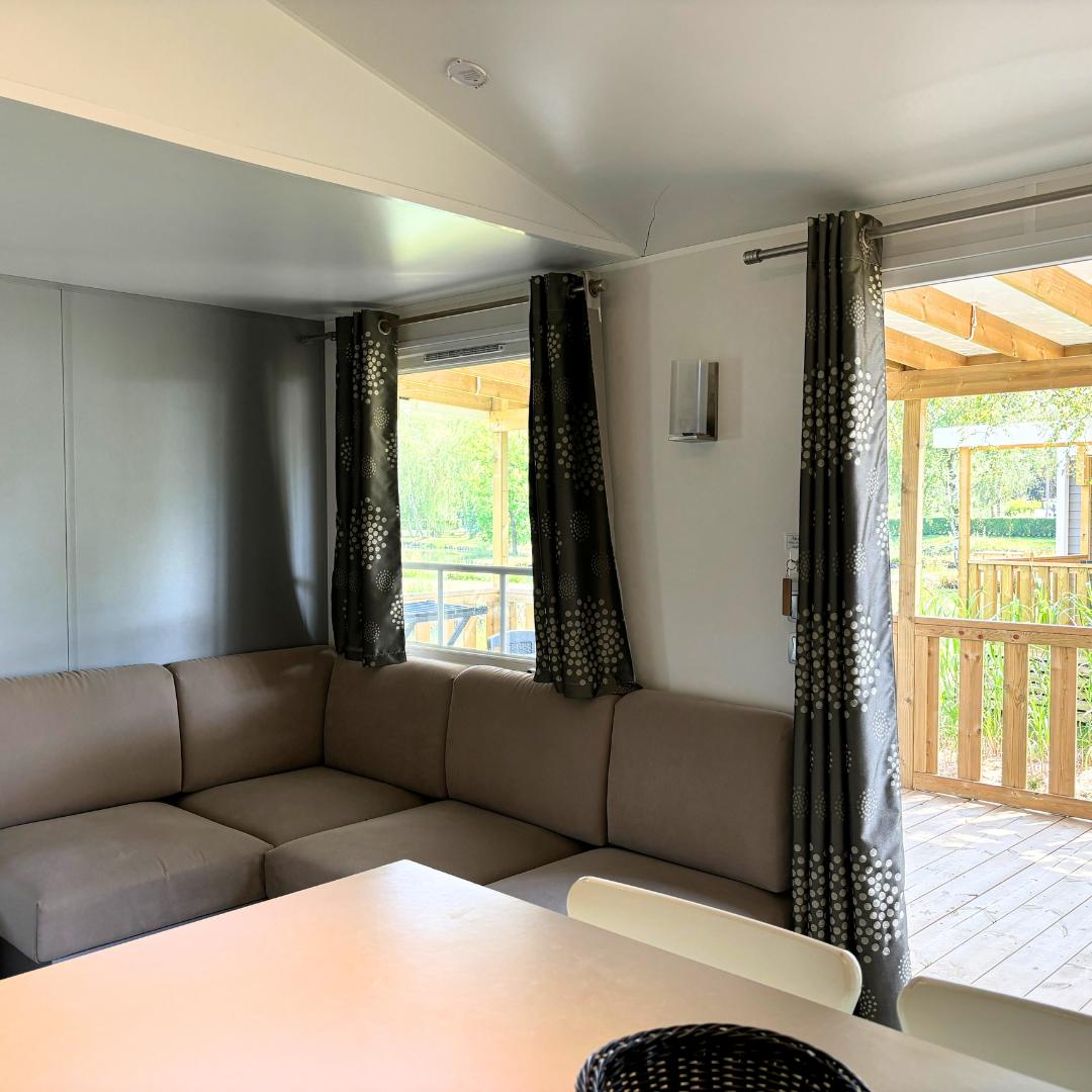 Salon mobil-home confort plus en 3 chambres